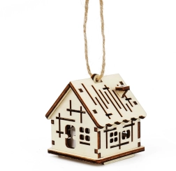 Wooden house with crosses and LED candle