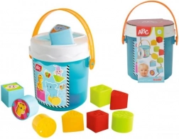 Emmer met vormensorteerder voor kinderen