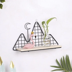 Wall-mounted decorative shelf in black – mountain motif