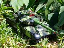 RC military tank with 2.4 GHz remote control in forest camouflage