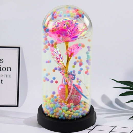 Eternal rose in a dome with LED lighting – pink with a little heart and colorful beads