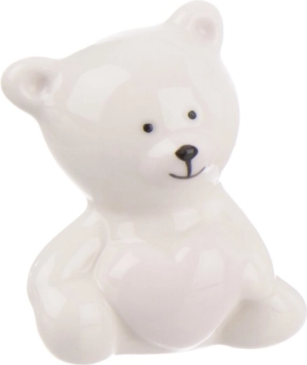 White porcelain teddy bear with a heart