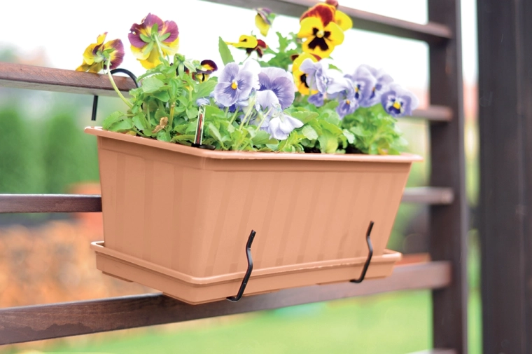 Improved drainage with compatible saucer