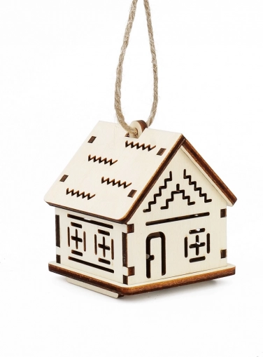 The Magic of Wood small house with zigzag patterns and LED candle