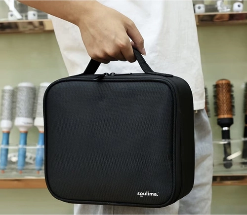 Secure zip closure and comfortable carrying