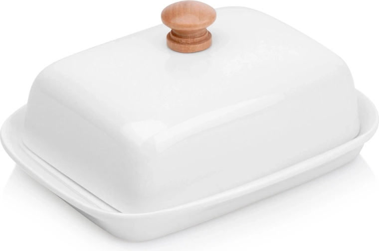 Witte keramische botervloot met houten handgreep