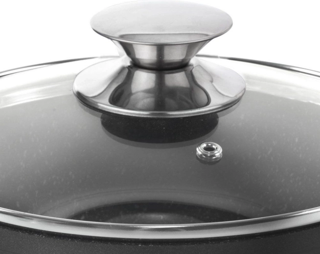 Glass lid with steam vent