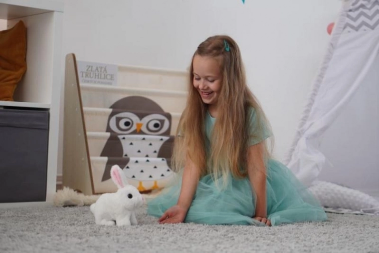 Interactive battery-powered plush bunny