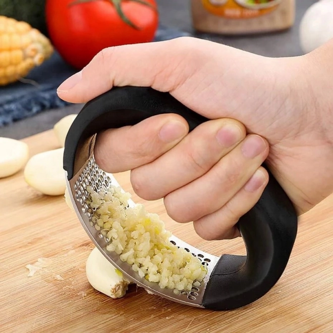 Ergonomic stainless steel garlic press