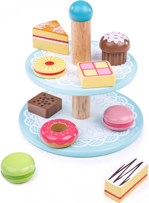 Supporto in legno con dolcetti giocattolo
