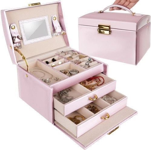 Pink satin jewelry box with key and mirror