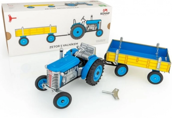 Trattore di latta Zetor con rimorchio a sponde, a carica a chiavetta, rosso/blu/verde