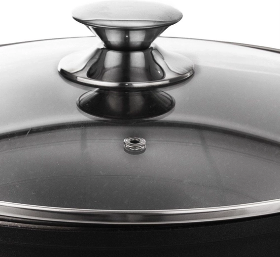 Glass lid with steam vent