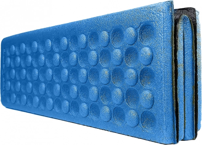 Folding foam seating pad for the outdoors