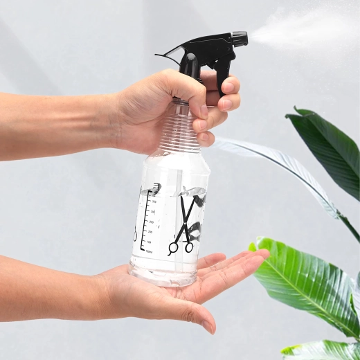 Transparent bottle with markings for level control