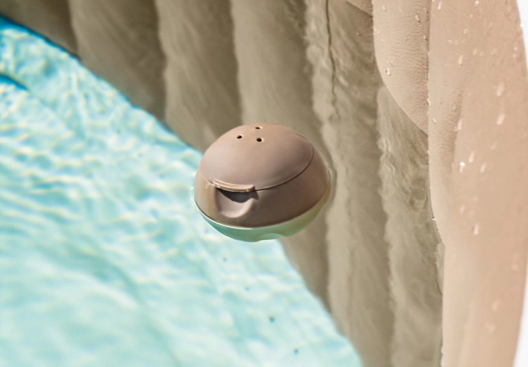Small floating dispenser for hot tub tablets