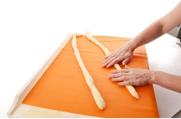 Comfortable rolling and shaping of dough