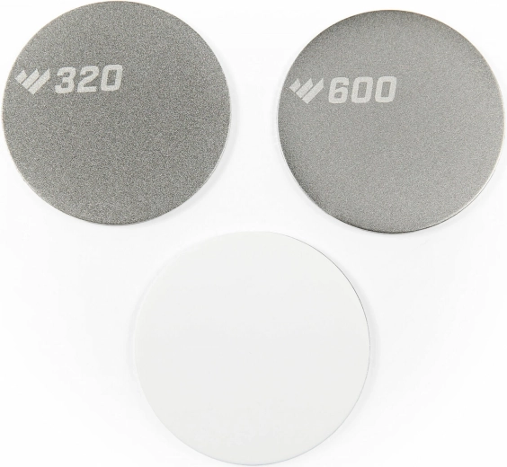 Interchangeable abrasive discs for coarse and fine sharpening