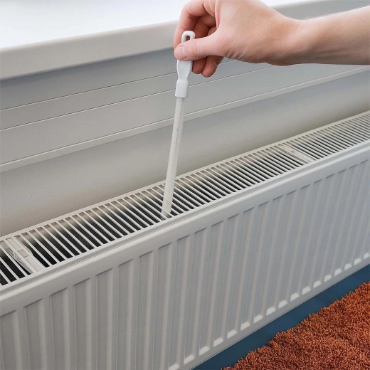 Atteint entre les ailettes des radiateurs