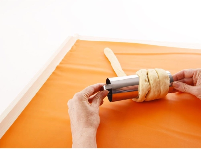 Smooth stainless-steel surface for even baking