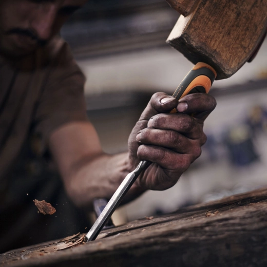 Handle with metal striking end