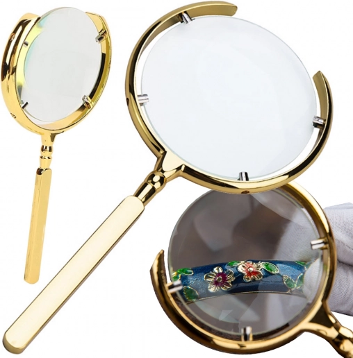 Gold handheld magnifier 6× with metal frame and glass lens