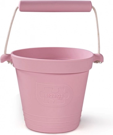 Silicone beach bucket light pink BIGJIGS TOYS