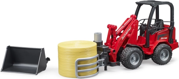 Prednji utovarivač Schäffer s hvataljkama za bale