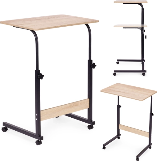 Mobile laptop side table next to armchair in light oak decor ModernHome