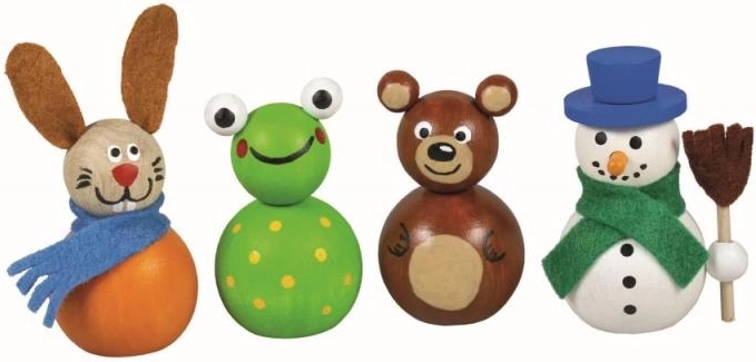 Three cute figures made of natural wood