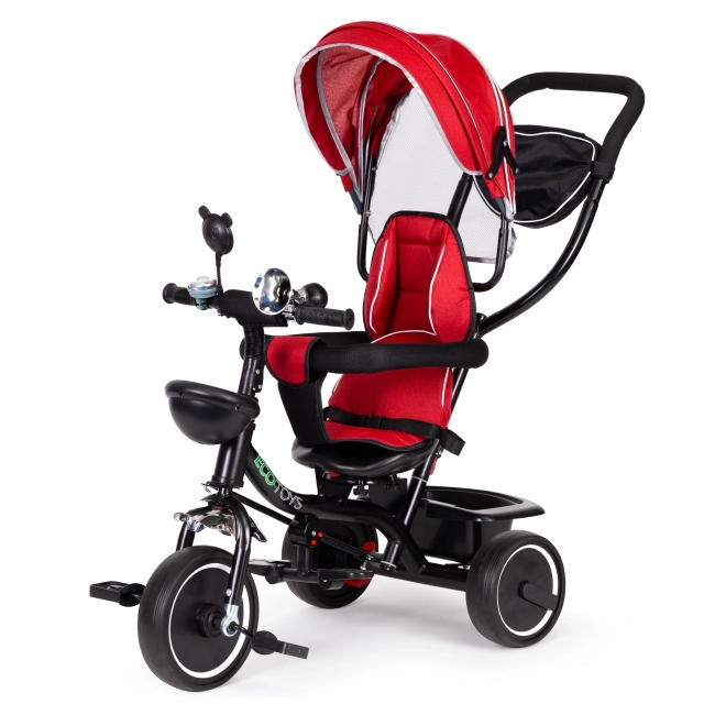 Triciclo con sedile girevole rosso