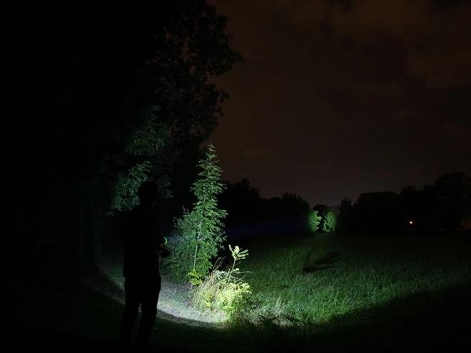 Green tactical flashlight with power bank