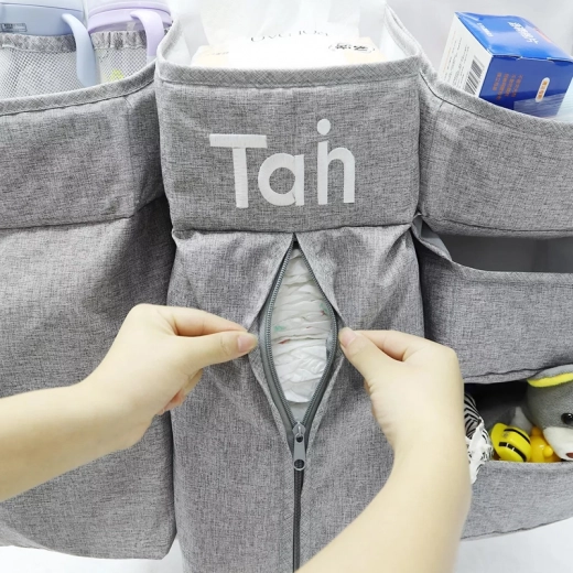 Pratica tasca con cerniera per pannolini e scorte più grandi