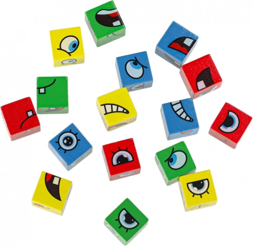 Colorful wooden blocks with eyes and mouths