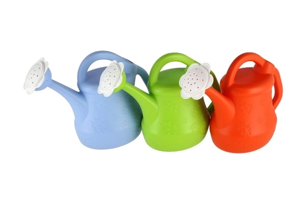Plastic watering can with floral pattern