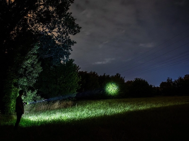 Green tactical flashlight with power bank