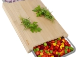 Ruhhy bamboo cutting board with pull-out containers