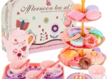 Children’s tea set in a suitcase with cakes