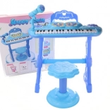 Blauw kinderpiano met adapter